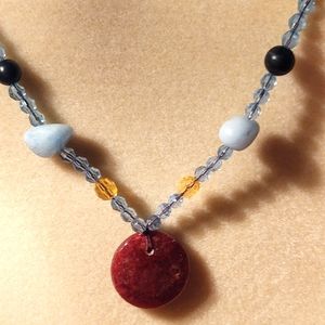 Necklace Hessonite Garnet pendant light blue and acrylic beads on a brown sat…